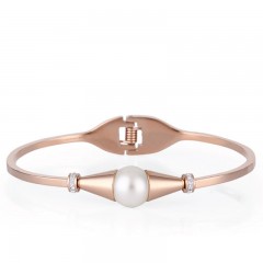 ŽENSKA FREELOOK ROZE ZLATNA NARUKVICA OD HIRURŠKOG ČELIKA SA BISEROM