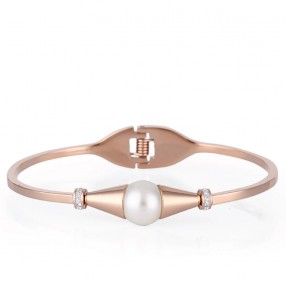 ŽENSKA FREELOOK ROZE ZLATNA NARUKVICA OD HIRURŠKOG ČELIKA SA BISEROM